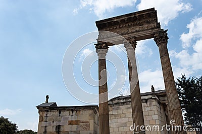 Three ancient pillars, old crypts and mausoleums located in Cementerio central Editorial Stock Photo